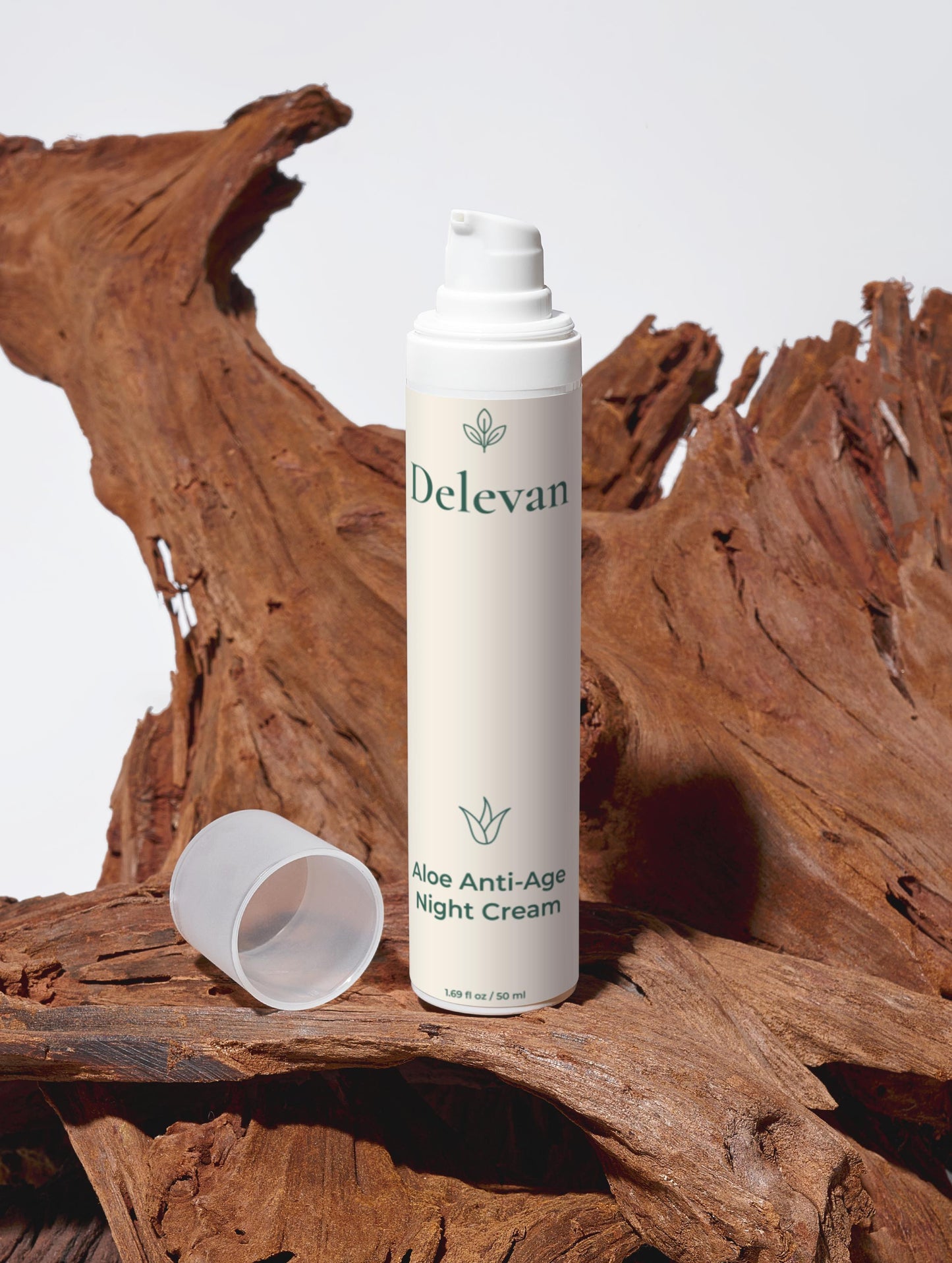 Delevan Aloe Anti-Age Night Cream bottle on a stylized wooden surface