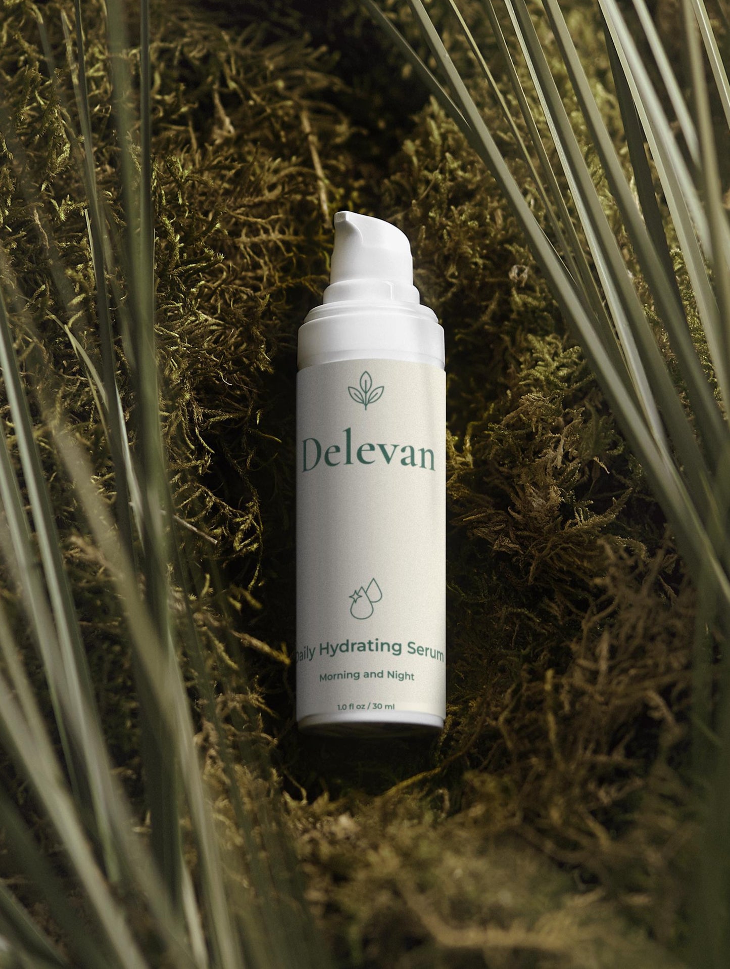 Delevan hydrating serum bottle on a natural background with plants