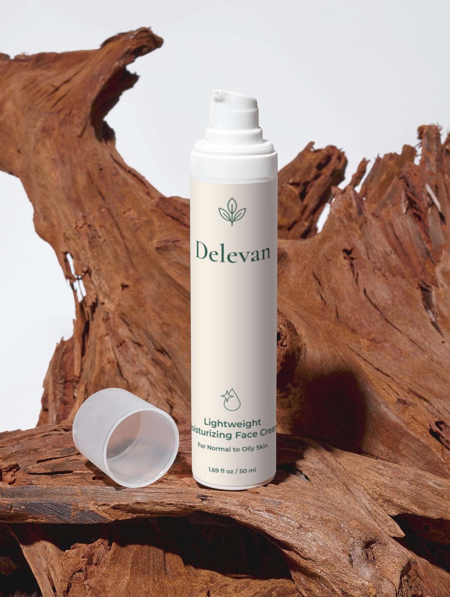 Delevan face cream bottle on a wooden surface